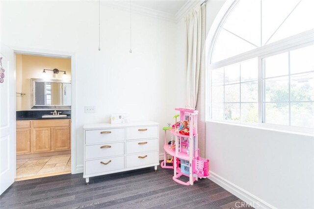 1935 Wollam St, Los Angeles, CA 90065 - recreation room featuring a sink, crown molding, dark wood finished floors, and baseboards