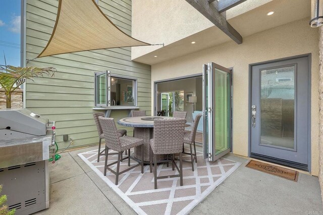 295 Chinquapin Ave, Carlsbad, CA 92008 - view of patio featuring grilling area and outdoor dining space
