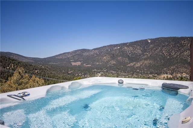 1903 Dusk Pl, Pine Mountain Club, CA 93225 - view of swimming pool with a mountain view and a hot tub