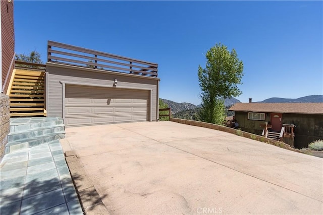 1903 Dusk Pl, Pine Mountain Club, CA 93225 - garage with a mountain view and concrete driveway