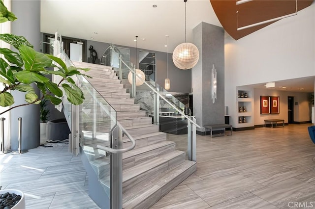 411 W Seaside Way Unit 1103, Long Beach, CA 90802 - staircase featuring a towering ceiling