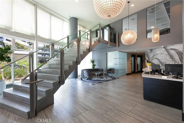 411 W Seaside Way Unit 1103, Long Beach, CA 90802 - stairs featuring a towering ceiling and healthy amount of natural light