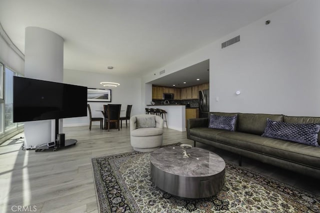 411 W Seaside Way Unit 1103, Long Beach, CA 90802 - living area featuring light wood-type flooring