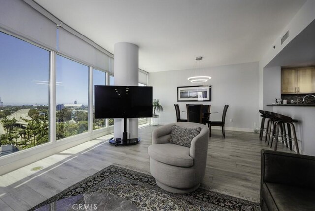 411 W Seaside Way Unit 1103, Long Beach, CA 90802 - living area with wood finished floors and baseboards