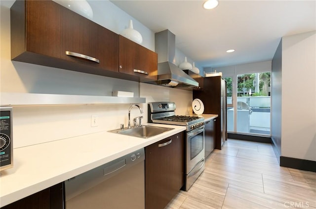 411 W Seaside Way Unit 1103, Long Beach, CA 90802 - kitchen with island exhaust hood, appliances with stainless steel finishes, a sink, light countertops, and dark brown cabinetry
