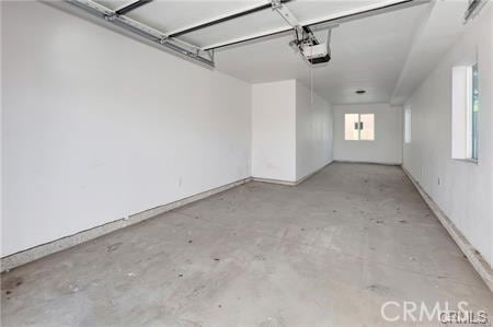 8418 S Main St, Los Angeles, CA 90003 - garage with a garage door opener