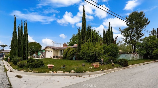13397 Robin Ct, Yucaipa, CA 92399 - view of front of property featuring a garage and a chimney