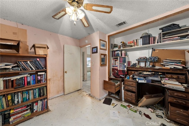 13397 Robin Ct, Yucaipa, CA 92399 - office featuring a textured ceiling, a ceiling fan, and concrete flooring