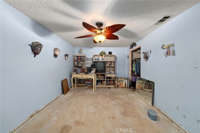 13397 Robin Ct, Yucaipa, CA 92399 - office area with a textured ceiling, unfinished concrete flooring, and ceiling fan