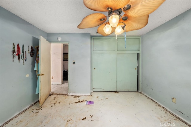 13397 Robin Ct, Yucaipa, CA 92399 - unfurnished bedroom with a closet, ceiling fan, and concrete floors