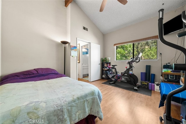 10831 Roycroft St Unit 8, Sun Valley, CA 91352 - bedroom featuring wood finished floors, high vaulted ceiling, a ceiling fan, and a textured ceiling
