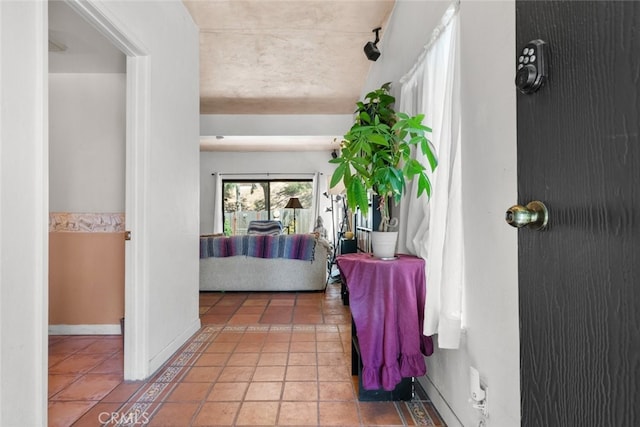 10831 Roycroft St Unit 8, Sun Valley, CA 91352 - corridor featuring tile patterned flooring