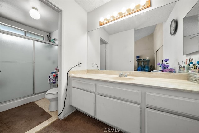 10831 Roycroft St Unit 8, Sun Valley, CA 91352 - full bath with a shower stall, vanity, toilet, and a textured ceiling