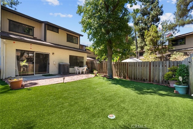 10831 Roycroft St Unit 8, Sun Valley, CA 91352 - view of yard featuring a patio and central AC unit