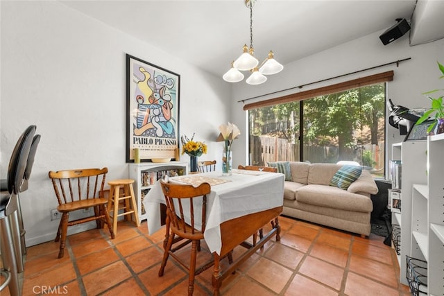 10831 Roycroft St Unit 8, Sun Valley, CA 91352 - tiled dining space featuring a chandelier