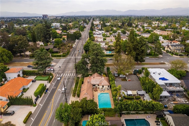 14060 Chandler Blvd, Sherman Oaks, CA 91401 - aerial perspective of suburban area with a pool and mountains
