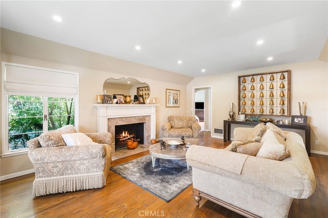 14060 Chandler Blvd, Sherman Oaks, CA 91401 - living area with wood finished floors, a premium fireplace, recessed lighting, and baseboards