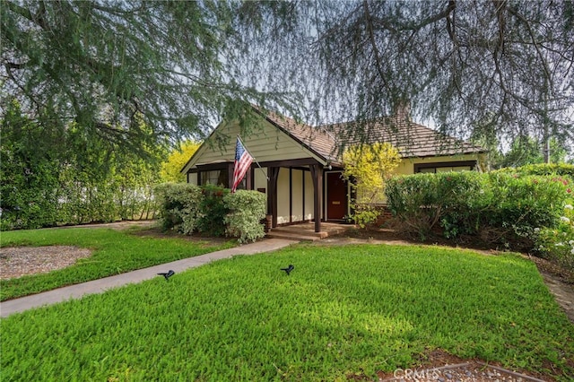 14060 Chandler Blvd, Sherman Oaks, CA 91401 - view of front of house featuring a front lawn and stucco siding