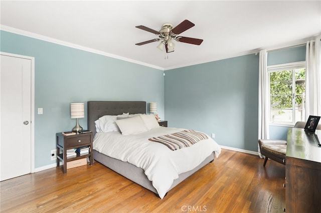 14060 Chandler Blvd, Sherman Oaks, CA 91401 - bedroom featuring baseboards, wood finished floors, crown molding, and a ceiling fan