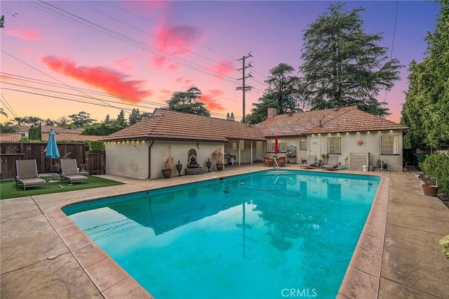 14060 Chandler Blvd, Sherman Oaks, CA 91401 - pool at dusk featuring a patio