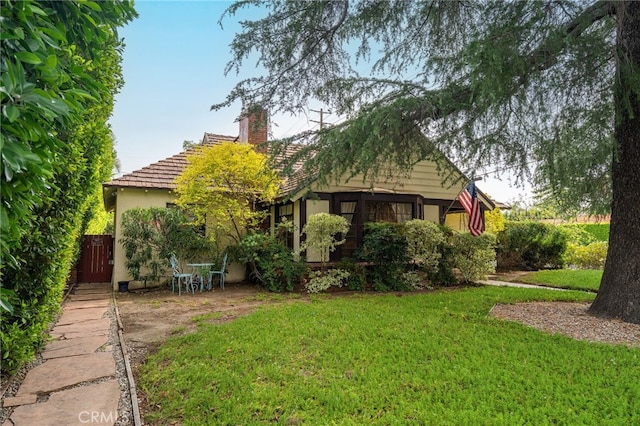 14060 Chandler Blvd, Sherman Oaks, CA 91401 - back of house with stucco siding and a chimney