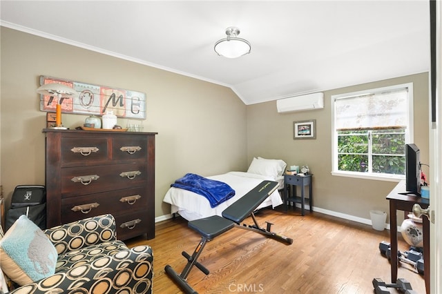 14060 Chandler Blvd, Sherman Oaks, CA 91401 - bedroom with a wall mounted air conditioner, vaulted ceiling, crown molding, light wood-type flooring, and baseboards