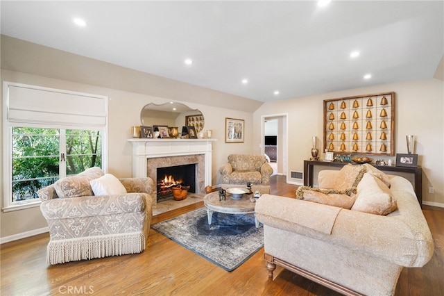 14060 Chandler Blvd, Sherman Oaks, CA 91401 - living room featuring wood finished floors, a fireplace, recessed lighting, and baseboards