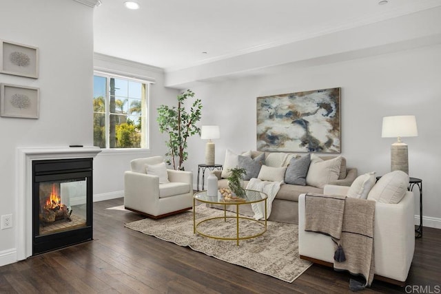 2778 Carlsbad Blvd Unit 201, Carlsbad, CA 92008 - living room featuring baseboards, dark wood finished floors, a multi sided fireplace, ornamental molding, and recessed lighting