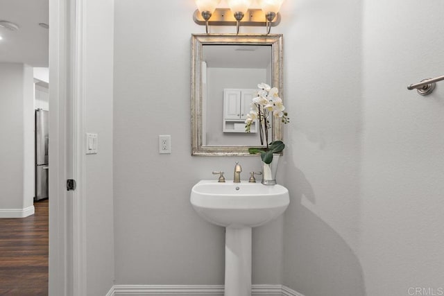 2778 Carlsbad Blvd Unit 201, Carlsbad, CA 92008 - bathroom with wood finished floors and baseboards