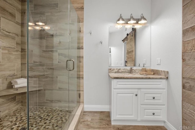 2778 Carlsbad Blvd Unit 201, Carlsbad, CA 92008 - full bath with vanity, a stall shower, and baseboards