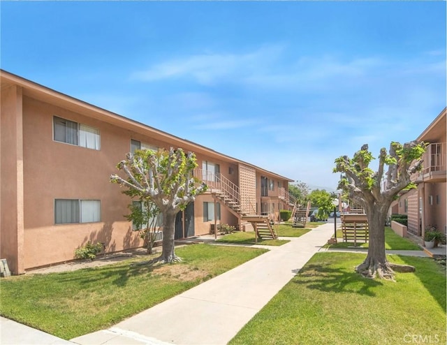 345 W 41st St, San Bernardino, CA 92407 - view of home's community featuring stairs and a yard