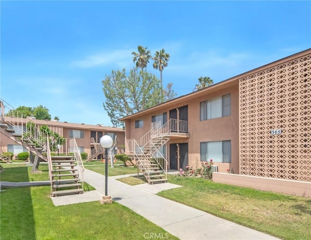 345 W 41st St, San Bernardino, CA 92407 - view of property featuring stairway