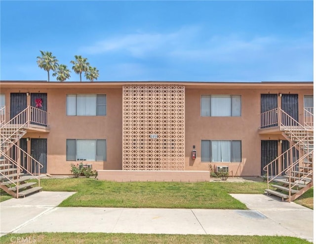 345 W 41st St, San Bernardino, CA 92407 - view of property with stairway