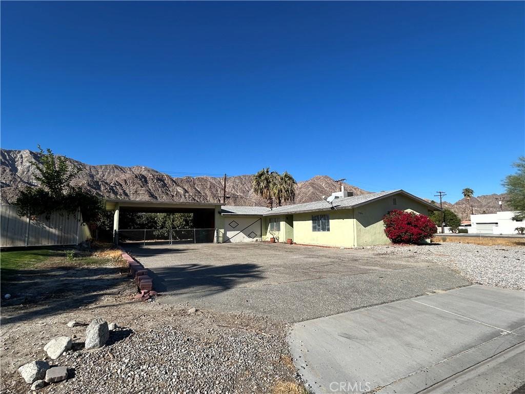 52295 Avenida Herrera Ln, Quinta, CA 92253 - view of front of home with a mountain view and asphalt driveway
