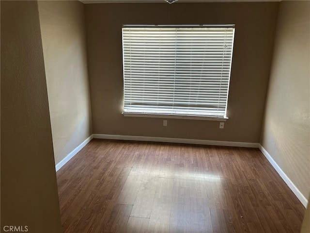 1715 Lake Way, Lancaster, CA 93534 - unfurnished room with wood finished floors and baseboards