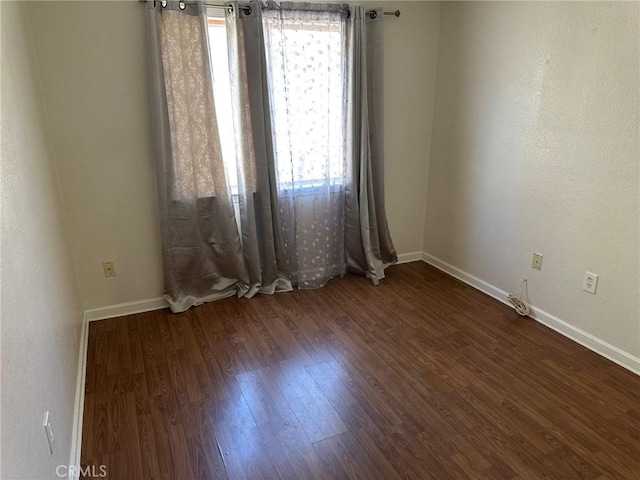 1715 Lake Way, Lancaster, CA 93534 - empty room with baseboards and wood finished floors