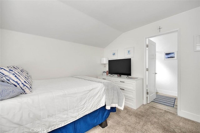 2693 Lookout Cir, Chino Hills, CA 91709 - bedroom featuring lofted ceiling, light carpet, and baseboards