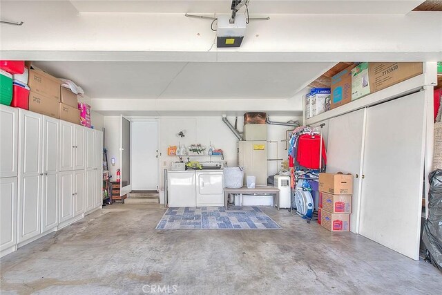 2693 Lookout Cir, Chino Hills, CA 91709 - garage featuring washer and dryer, a garage door opener, and heating unit