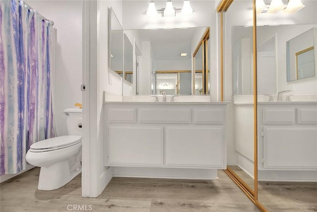 2693 Lookout Cir, Chino Hills, CA 91709 - full bath with wood finished floors, toilet, and vanity