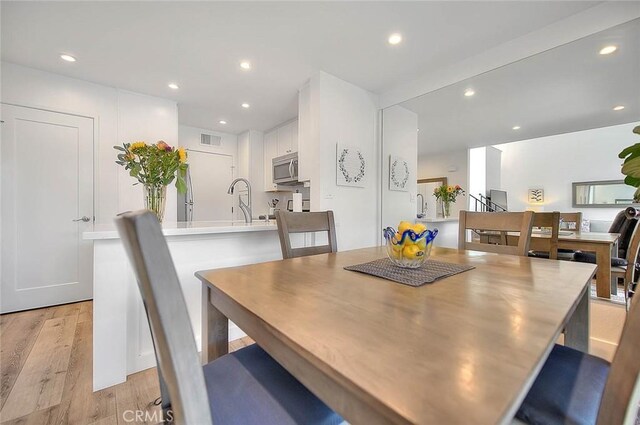2693 Lookout Cir, Chino Hills, CA 91709 - dining room featuring light wood-style floors and recessed lighting