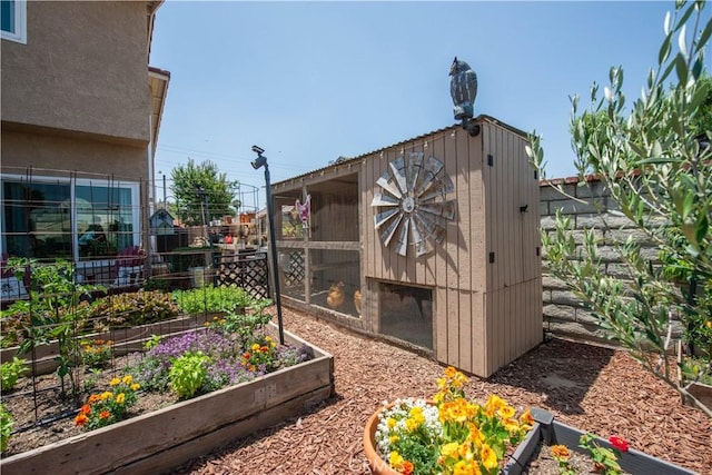 22447 Poplar St, Saugus, CA 91390 - view of poultry coop featuring a vegetable garden