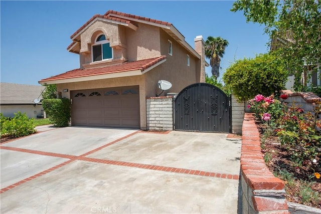 22447 Poplar St, Saugus, CA 91390 - mediterranean / spanish home with a tile roof, stucco siding, and driveway