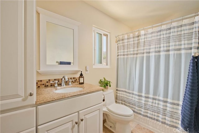 22447 Poplar St, Saugus, CA 91390 - full bathroom featuring toilet, vanity, a shower with shower curtain, and decorative backsplash