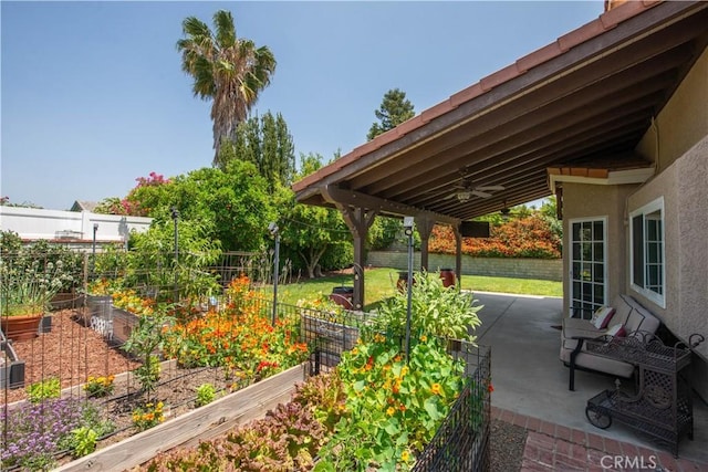22447 Poplar St, Saugus, CA 91390 - view of patio with a vegetable garden and a ceiling fan