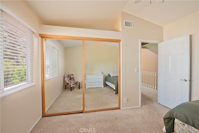 22447 Poplar St, Saugus, CA 91390 - carpeted bedroom featuring lofted ceiling, a closet, and baseboards