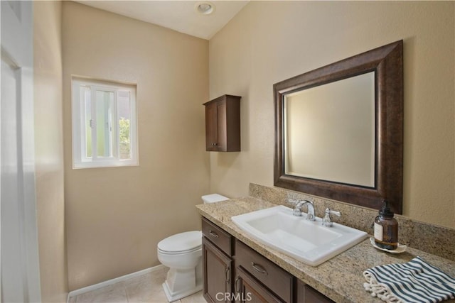22447 Poplar St, Saugus, CA 91390 - bathroom featuring vanity, toilet, baseboards, and tile patterned floors
