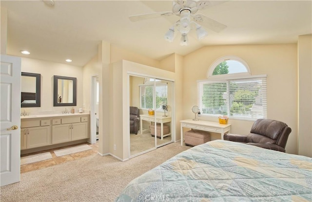 22447 Poplar St, Saugus, CA 91390 - bedroom with a sink, light carpet, vaulted ceiling, a closet, and ensuite bath