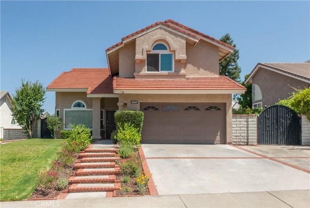 22447 Poplar St, Saugus, CA 91390 - mediterranean / spanish-style house featuring stucco siding, a tile roof, concrete driveway, and a garage