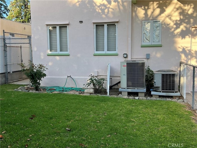 1465 N Euclid Ave, Upland, CA 91786 - back of house featuring central AC unit and stucco siding