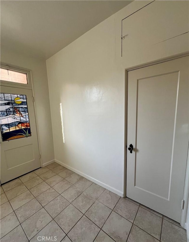 1465 N Euclid Ave, Upland, CA 91786 - empty room with light tile patterned floors and baseboards